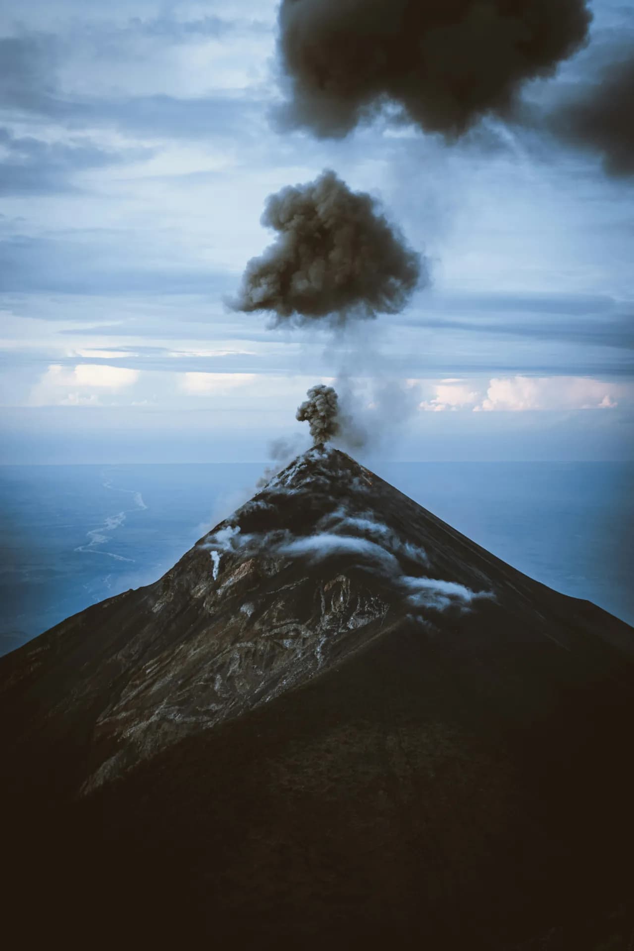Volcán de Fuego visible beyond the ridge